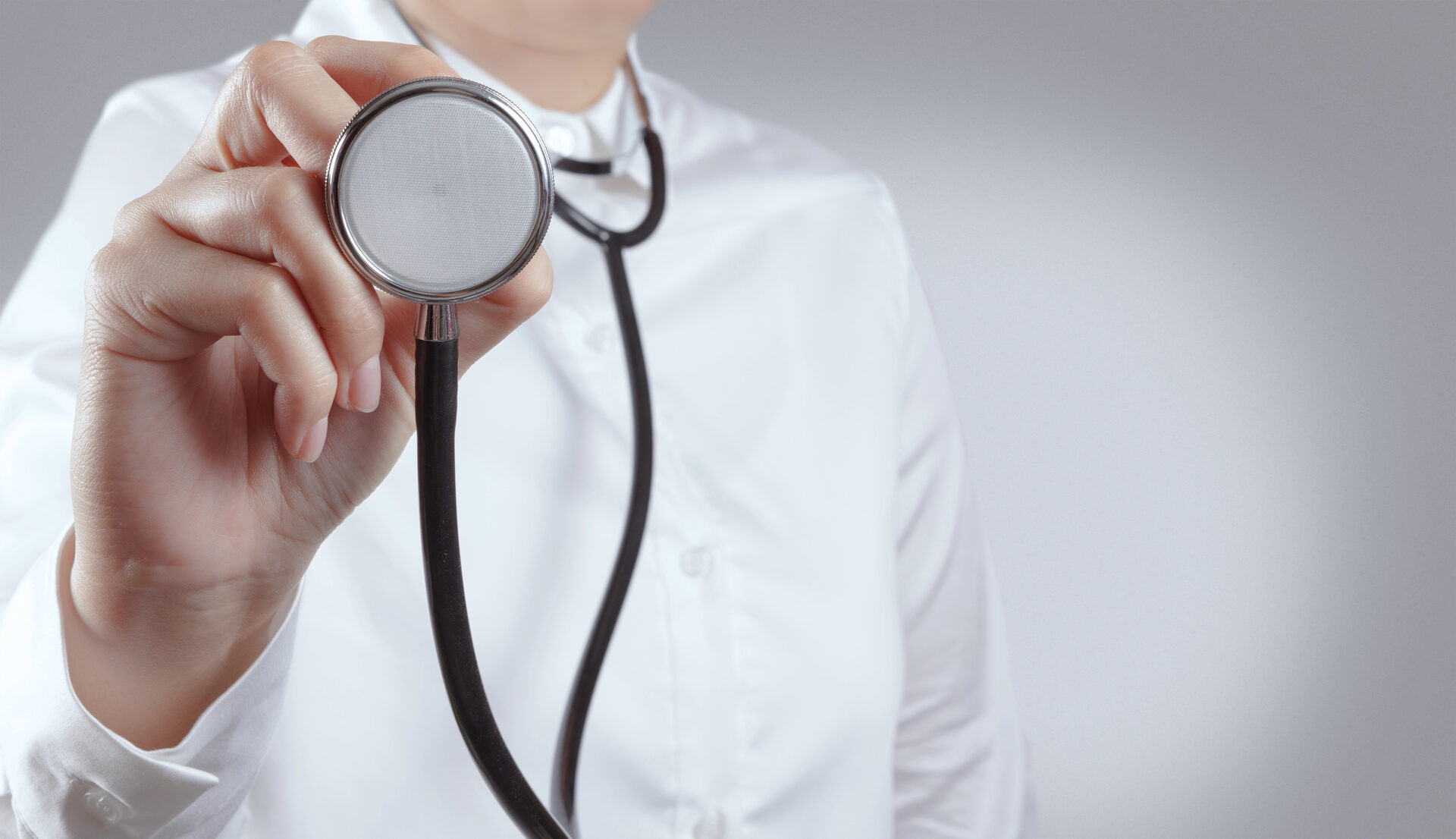 Doctor with stethoscope at NY North Medical Clinic